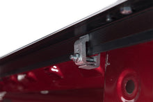 Load image into Gallery viewer, Tonno Pro 09-19 Dodge RAM 1500 Lo-Roll Tonneau Cover clamp detail, ideal for engine performance and aftermarket upgrades at DTX Performance