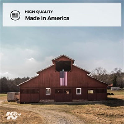 Red barn with American flag and 