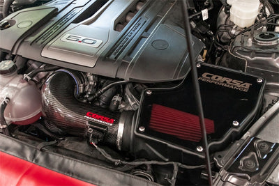 Corsa 2018-2023 Ford Mustang GT 5.0L V8 Carbon Fiber Air Intake w/ DryTech Filter in a car engine bay