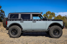 Load image into Gallery viewer, Off-road vehicle with Mickey Thompson Baja Legend MTZ Tire - 37X12.50R17LT 124Q 90000057352 parked on gravel terrain.