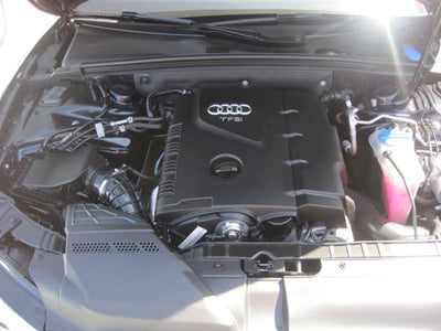 K&N Audi A4 1.8L Drop In Air Filter installed in engine bay, boosting performance car parts efficiency and engine power upgrades.