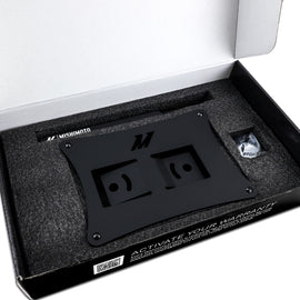 Mishimoto 2023+ Toyota GR Corolla License Plate Relocation Kit in packaging for high-performance car enthusiasts