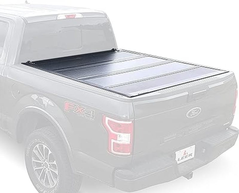 LEER 2017+ Ford Super Duty HF650M 6Ft9In Tonneau Cover - Folding on truck bed, durable, weather-resistant, sleek design.