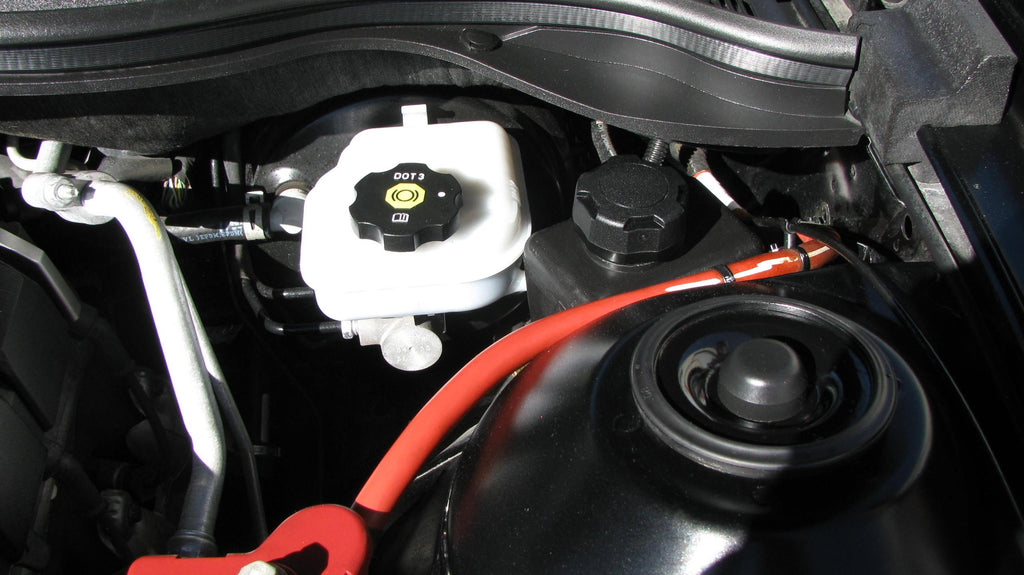 2010-15 Camaro Washer Fluid Reservoir II Relocation Kit for DTX Performance tuning upgrades.