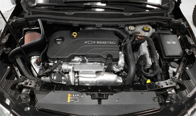 K&N 17-18 Chevy Cruze 1.4L Turbo Silver Typhoon Short Ram Intake installed in engine bay; DTX Performance; aftermarket performance parts