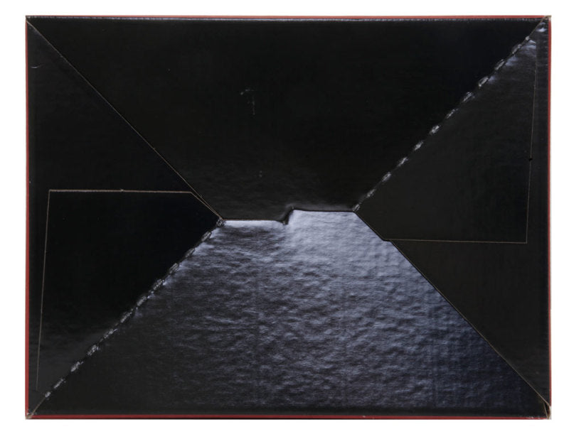 Back view of a closed, black origami-style folder, showcasing intricate folding design and texture.