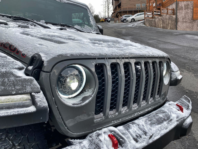 Oracle Lighting 18-22 Jeep Wrangler JL Oculus Bi-LED Projector Headlights on snowy mountain road