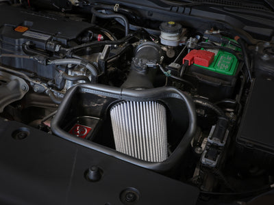 aFe Takeda Intakes Stage-2 CAIS w/ Pro Dry S Media 16-18 Honda Civic 2.0L (blk) in engine bay of 2016-2018 Civic.