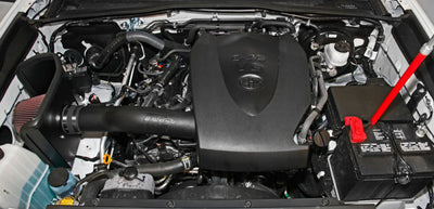 K&N 2016 Toyota Tacoma V6 3.5L AirCharger Performance Intake installed in engine bay, enhancing performance and airflow.