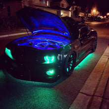 Load image into Gallery viewer, Oracle Universal Dynamic LED Underbody Kit - ColorSHIFT - Dynamic on a performance car with vibrant underglow.