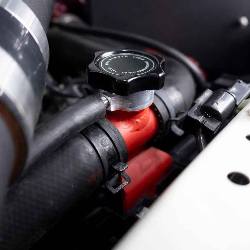 Mishimoto 08-15 Mitsubishi Lancer Evo X Coolant Fill Inlet - Black, high performance car parts, DTX Performance auto part upgrade