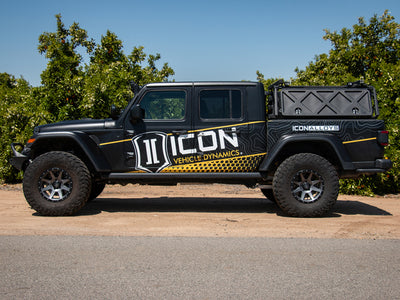 ICON 2020+ Jeep Gladiator JT 2.5in Stage 1 Suspension System in off-road terrain showcasing performance car tuning.