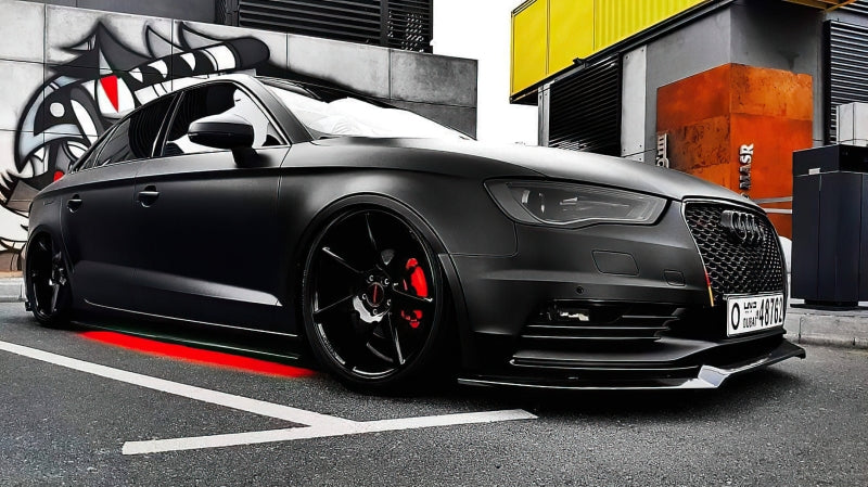 Oracle Universal Dynamic LED Underbody Kit - ColorSHIFT - Dynamic on a performance car, matte black finish, in a garage setting