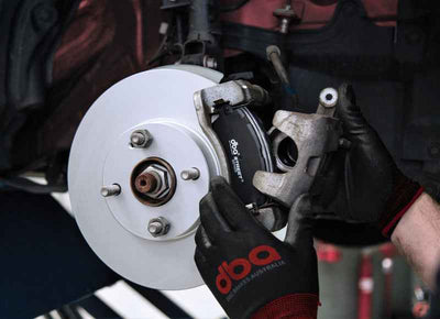 DBA 07+ Honda Civic FD2-R Slotted Street T2 Series Front Rotor installation - high performance brake upgrade by DTX Performance