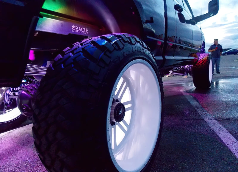 Oracle Bluetooth + RF Underbody Rock Light Kit on truck showcasing vibrant lighting and performance features - ColorSHIFT technology