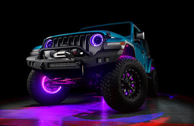 ORACLE Lighting LED Illuminated Wheel Rings - ColorSHIFT RGB+W on an off-road vehicle with high performance brakes.
