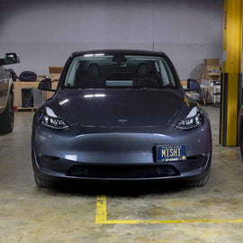 Mishimoto 2020+ Tesla Model Y License Plate Relocation Kit installed, optimizing performance at DTX Performance.