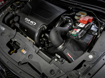 aFe Magnum FORCE Stage-2 Pro DRY S Cold Air Intake System 10-18 Ford Taurus SHO V6-3.5L (tt) in engine bay