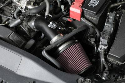 K&N 2018 Toyota Camry SE L4-2.5L F/I Typhoon Cold Air Intake installation in engine bay for performance upgrades at DTX Performance.