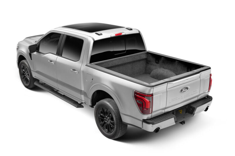 RealTruck 15-26 Ford F150 Super Crew / 17-26 F250/F350 SD Super Cab Traxio 4in Nerf Bars - Tex. Blk