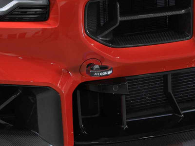 aFe 23-25 BMW M2 (G87) CONTROL Front / Rear Tow Hook - Black, performance car parts, installed on red vehicle, DTX Performance