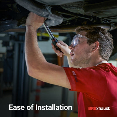 Mechanic installing MagnaFlow BRE Exhaust Kit 86-88 Toyota Pickup 2.4L with ease