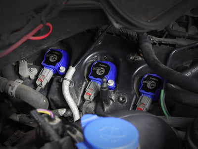 aFe 11-16 Ford F-150 Scorcher High-Performance Ignition Coil (6 Pack) installed in engine, performance car parts