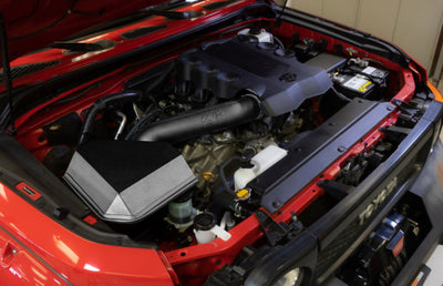 K&N 10-23 Toyota 4Runner 4.0L V6 Performance Air Intake System in engine bay, performance upgrades by DTX Performance.