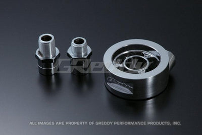 GReddy Universal Oil Filter Block Adapter for performance car parts and engine upgrades by veteran owned DTX Performance shop.