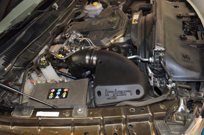 Injen 13-17 Dodge Cummins 2500/3500 6.7L Evolution Intake installed in engine, boosting performance with this cold air intake.