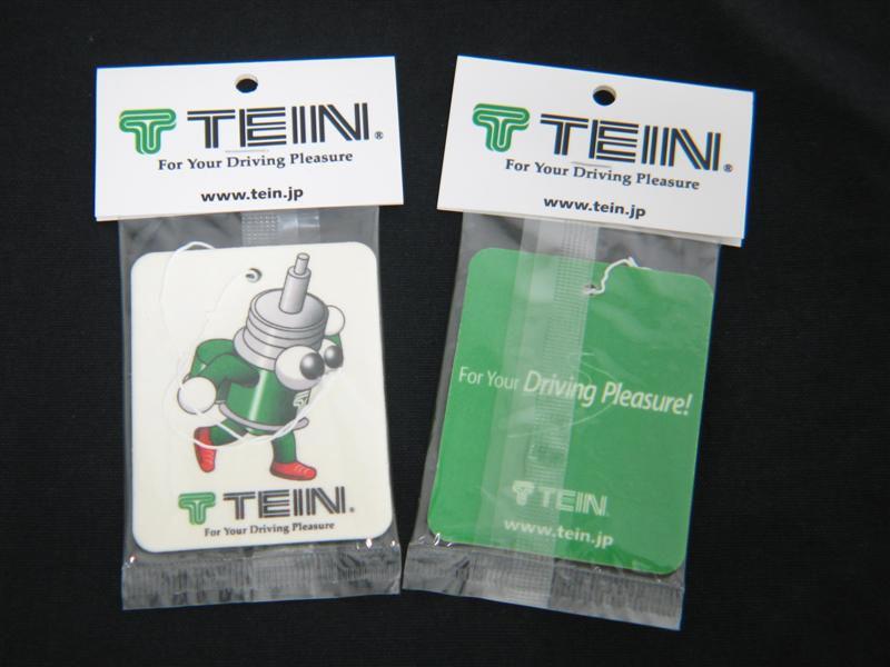 Tein Air Freshener - Vanilla, DTX Performance auto scent with racing suspension graphic, perfect for high performance car enthusiasts.
