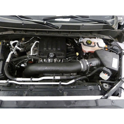 Airaid 19-20 Chevrolet Silverado 1500 L4-2.7L Jr Intake Kit - Oiled / Yellow Media installed in engine bay