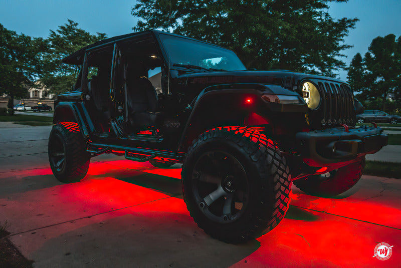 Oracle Bluetooth + RF Underbody Rock Light Kit - 8 PCS - ColorSHIFT on Jeep showcasing LED lighting for off-road vehicles
