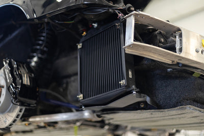 CSF Porsche 964/993 OEM+ Performance Fender Oil Cooler installation, enhancing engine performance from DTX Performance shop.