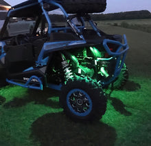 Load image into Gallery viewer, Off-road vehicle with Oracle Bluetooth + RF Underbody Rock Light Kit - 8 PCS - ColorSHIFT for performance upgrades.
