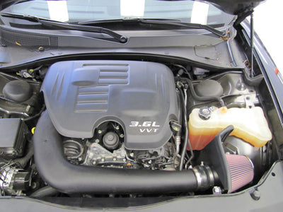 K&N 11-14 Dodge Charger 3.6L V6 Performance Intake installed, boosting engine performance with durable cold air intake system.
