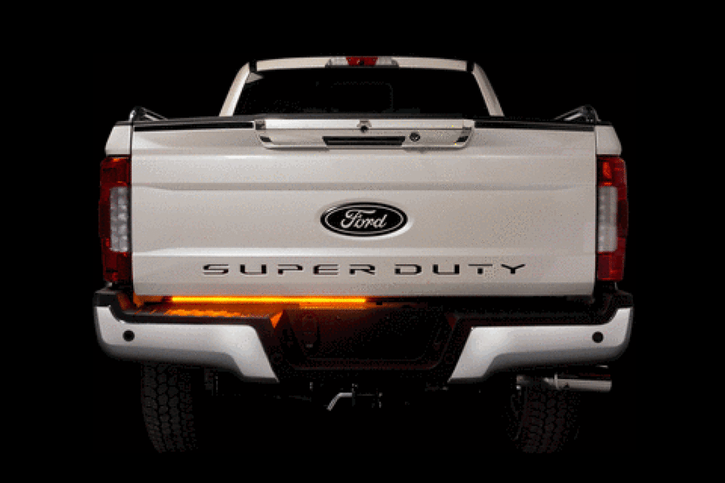 Putco 48in LED Tailgate Light Bar Blade on a Ford truck showcasing high visibility, perfect for performance car parts enthusiasts.