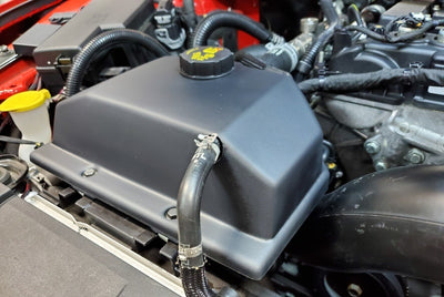 JLT 15-19 Ford Mustang Black Textured Coolant Tank Cover in engine bay, ideal for performance car parts, from DTX Performance.