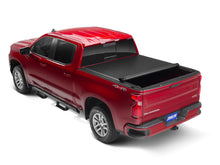 Load image into Gallery viewer, Tonno Pro 14-19 Chevy Silverado 1500 5.8ft Fleetside Lo-Roll Tonneau Cover on red truck