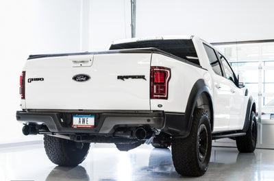 AWE Tuning 2017+ Ford Raptor 0 FG Performance Exhaust System - w/ Diamond Black Tips on parked vehicle
