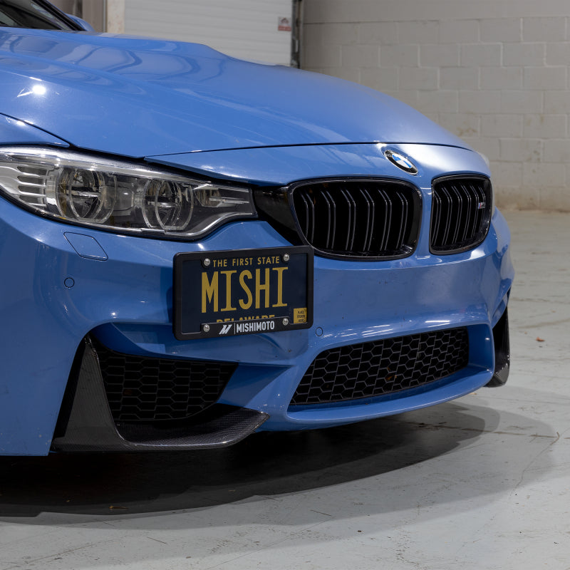 Mishimoto 15-20 BMW F8X M3/M4 License Plate Relocation Kit for performance car enthusiasts at DTX Performance.