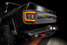 Load image into Gallery viewer, Oracle 2020+ Jeep Gladiator JT Flush Mount LED Tail Lights - Tinted Lens on a black Jeep, featuring sleek design and high performance auto parts