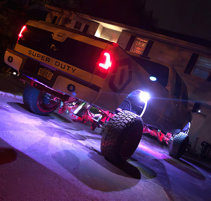 Oracle Bluetooth + RF Underbody Rock Light Kit - 8 PCS - ColorSHIFT installed on off-road truck at night