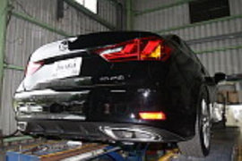 Invidia 12+ Lexus GS350 Q300 Axle-Back Exhaust installation in garage