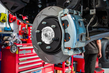 Load image into Gallery viewer, DBA 15-21 Subaru WRX STI XP Performance Front Brake Pads installed in a high performance shop.