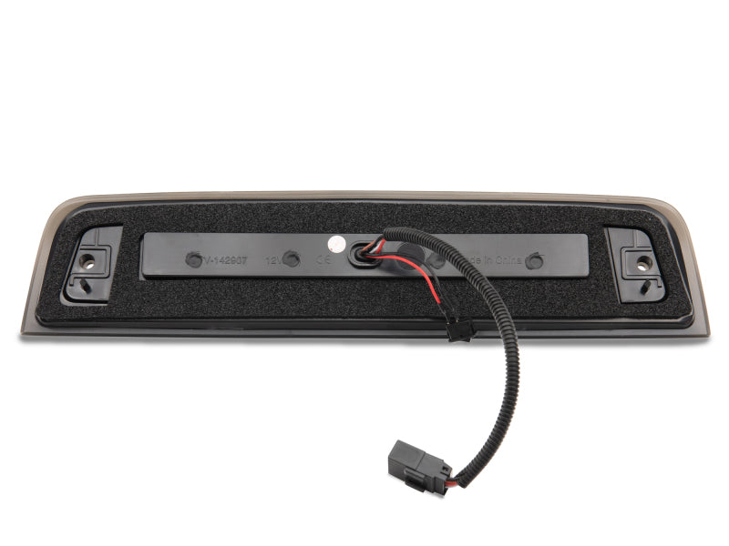 Raxiom 09-18 Dodge RAM 1500 10-18 RAM 2500/3500 Axial Series LED Third Brake Light (Smoked) for enhanced truck visibility and safety.