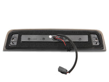 Load image into Gallery viewer, Raxiom 09-18 Dodge RAM 1500 10-18 RAM 2500/3500 Axial Series LED Third Brake Light (Smoked) for enhanced truck visibility and safety.