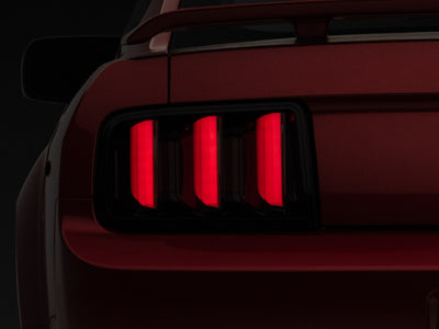 Raxiom 05-09 Ford Mustang Vector V2 LED Tail Lights- Black Housing (Smoked Lens) - High Performance Car Parts