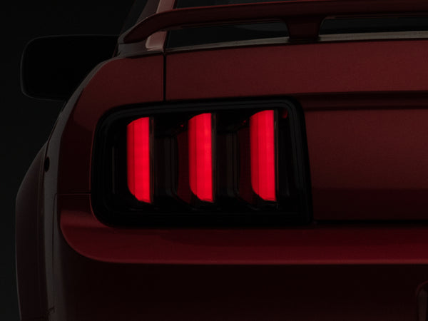 Raxiom 05-09 Ford Mustang Vector V2 LED Tail Lights- Black Housing (Smoked Lens) - High Performance Car Parts