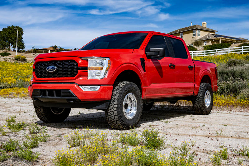 Red Ford F-150 with ICON 3in lift kit